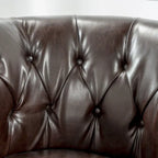 Clubsessel aus gebundenem Leder mit Knopfheftung